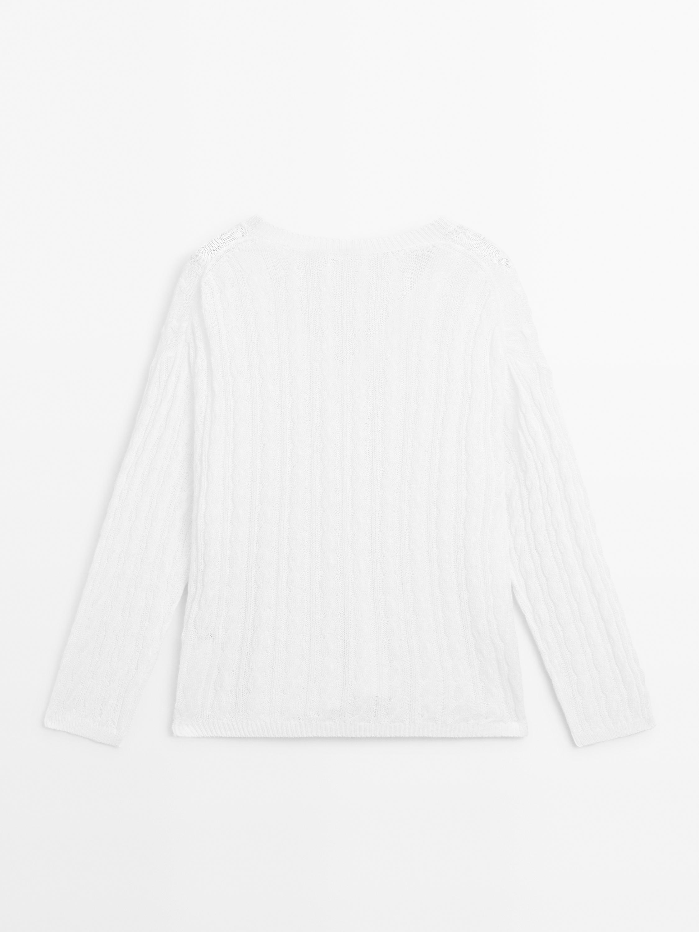 Pull coton en maille tressée ajourée